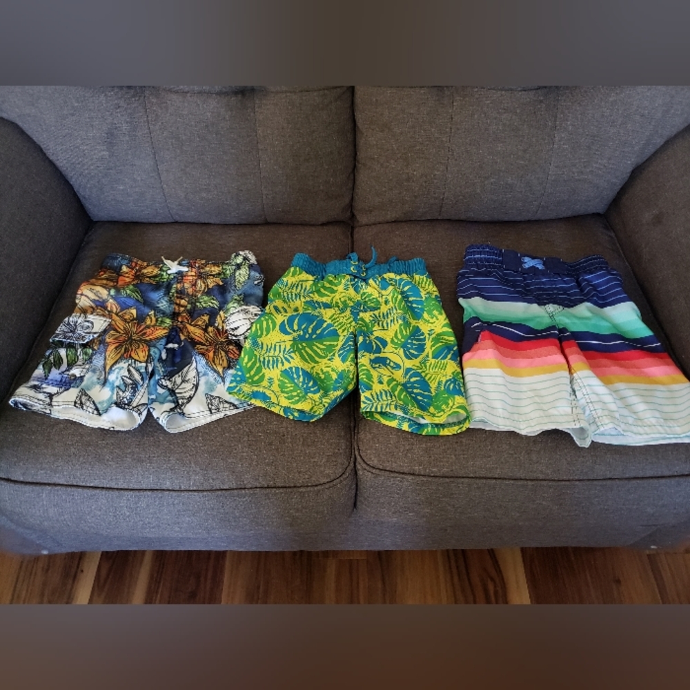 Lot of 3 boys swim trunks, sizes XS and S